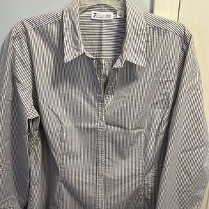 Woman long sleeve black and white striped shirt.